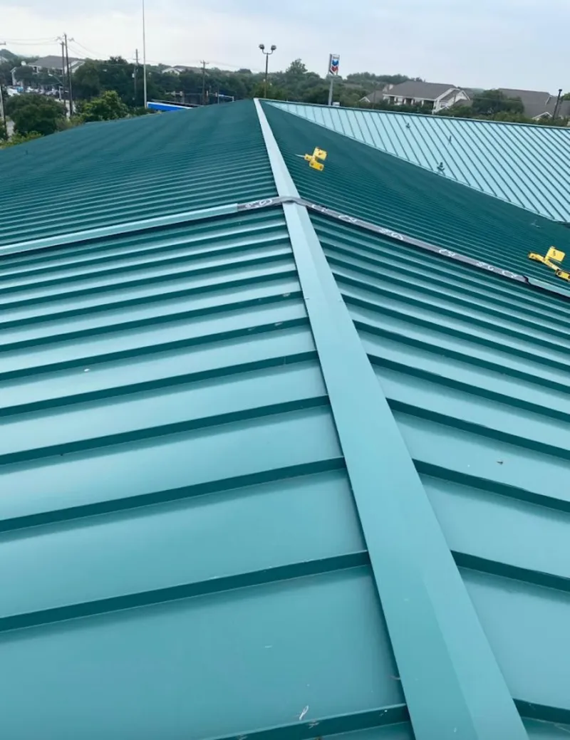 Green commercial metal roof ridge and valley for Metal Roof Repair in Pemberton